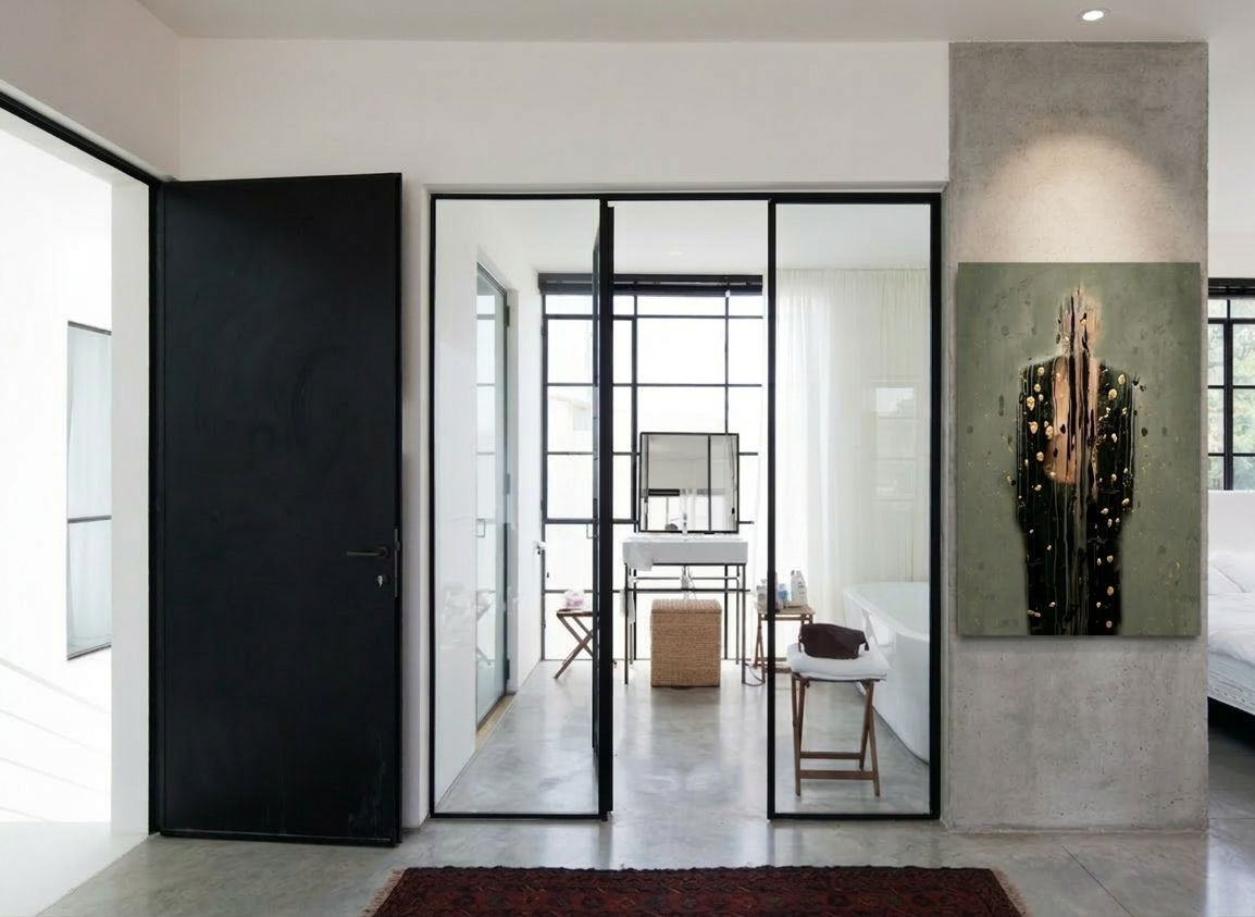 A single artwork as the focal point of a minimalist, monochromatic renovated Bauhaus home in Tel Aviv