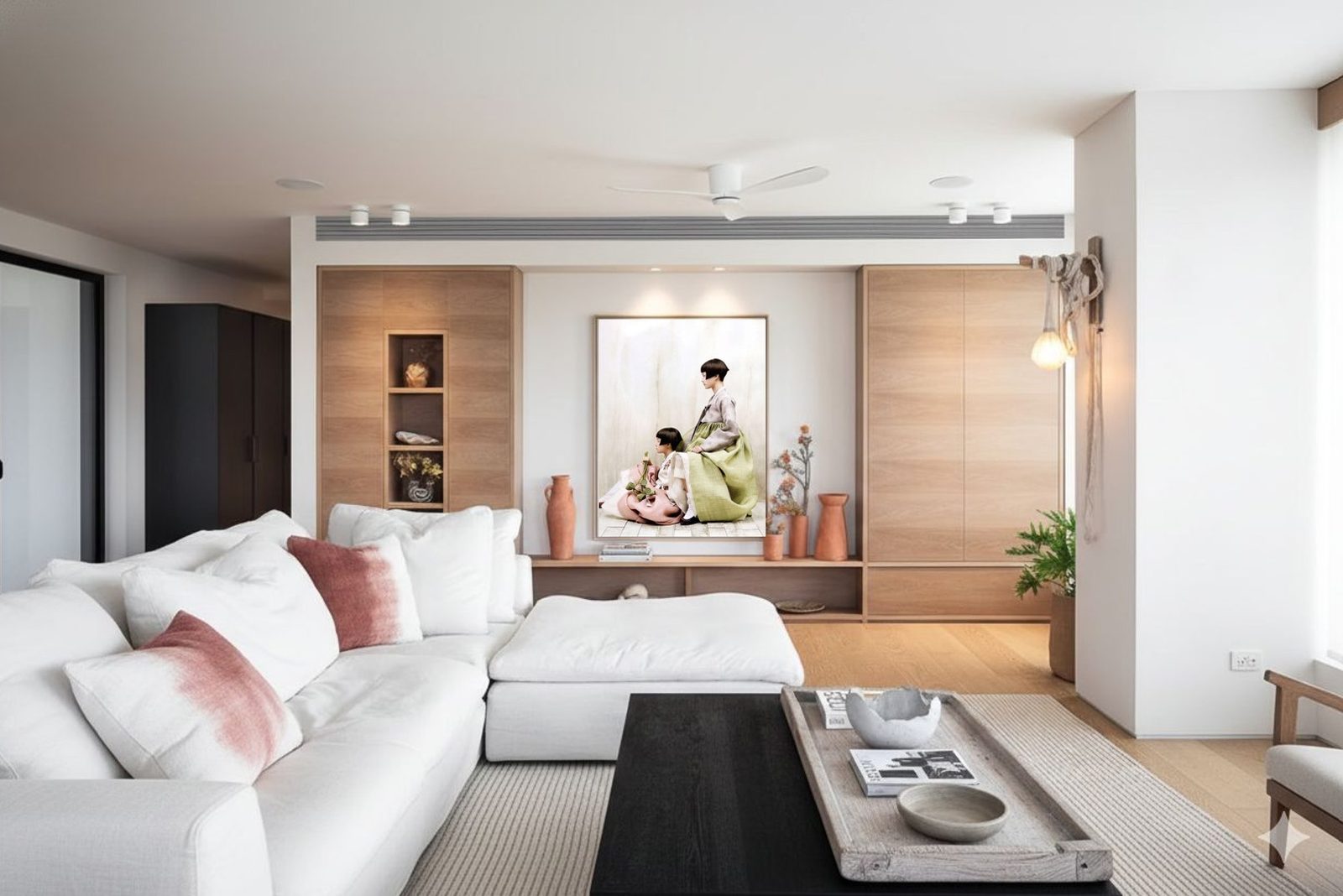 Living room in a Ramat Gan private home: white sofa, oak cabinetry, and a large format photograph of two figures in green and pink ceremonial dress on the central wall