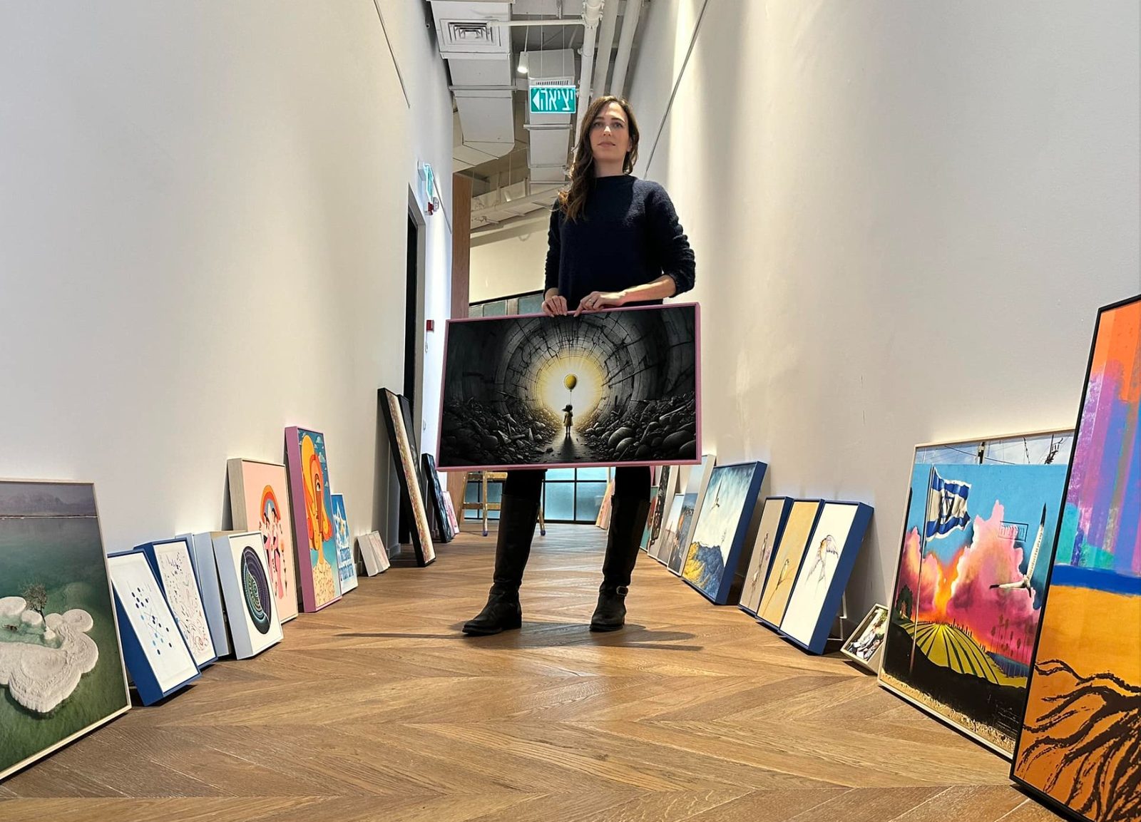 Stav Theodor in the gallery at the Creating Hope exhibition